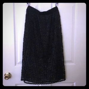 Black floral pleated a-line skirt